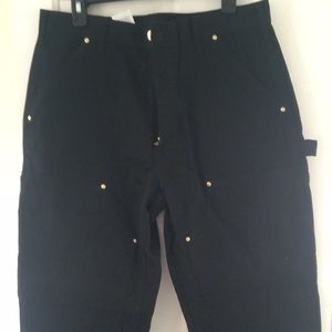 Double front, firm duck, black Carhartts.